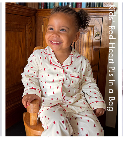 Kids' red heart pyjamas in a bag
