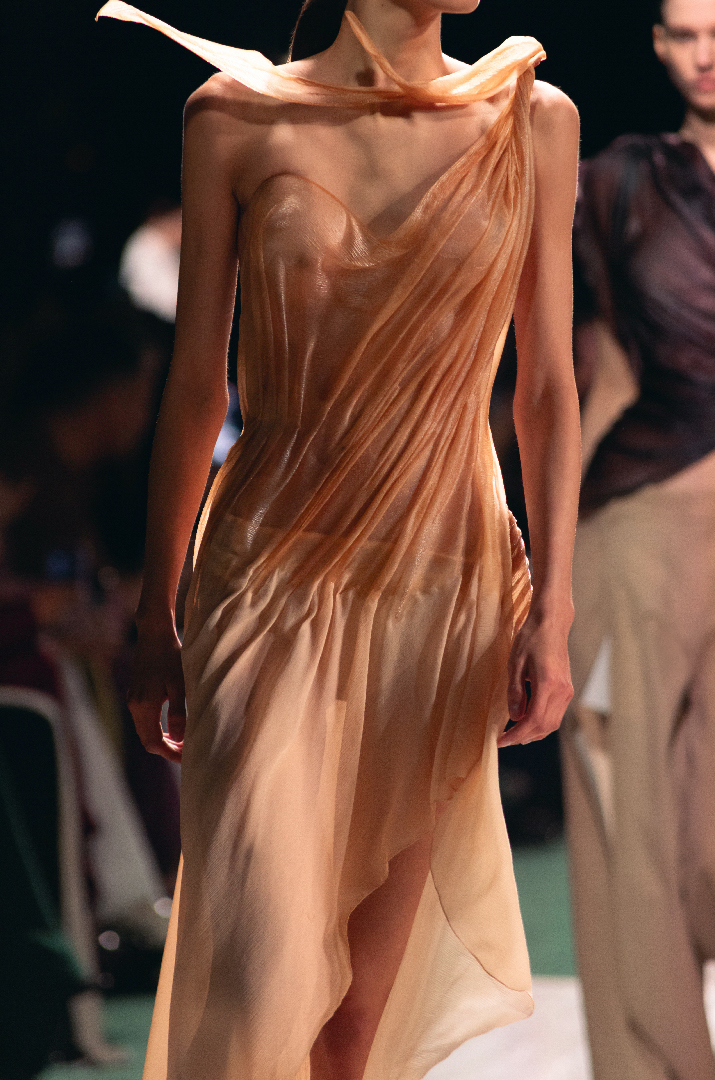 Women in a gathered bodice dress