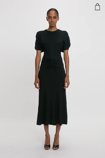 Women in black midi gathered waist dress