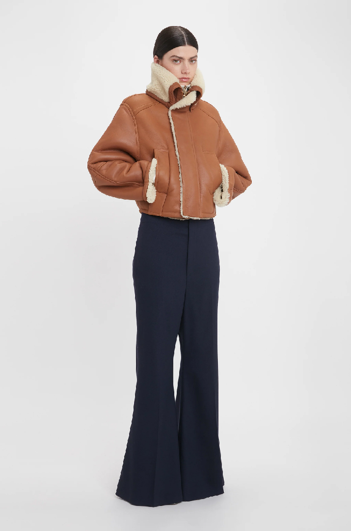 Women in brown coat 