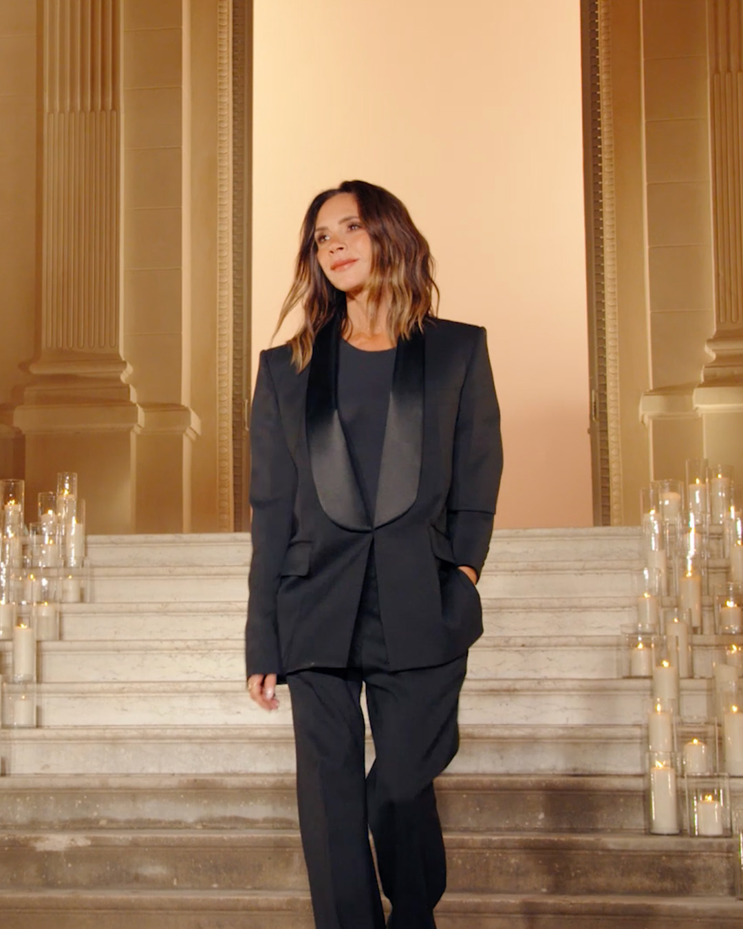 Victoria Beckham in black blazer suit 