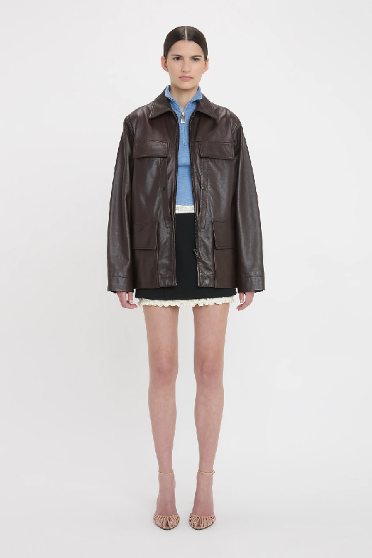 Women in brown leather jacket 