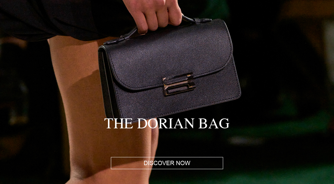 A small back bag with gold B detail 
