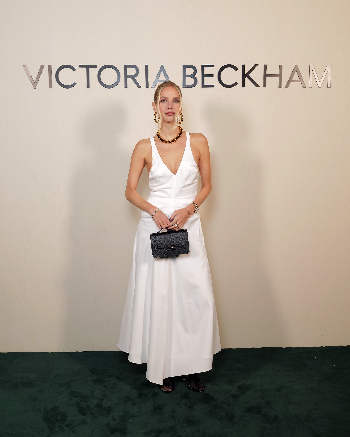 Women in gathered racer back dress in white 