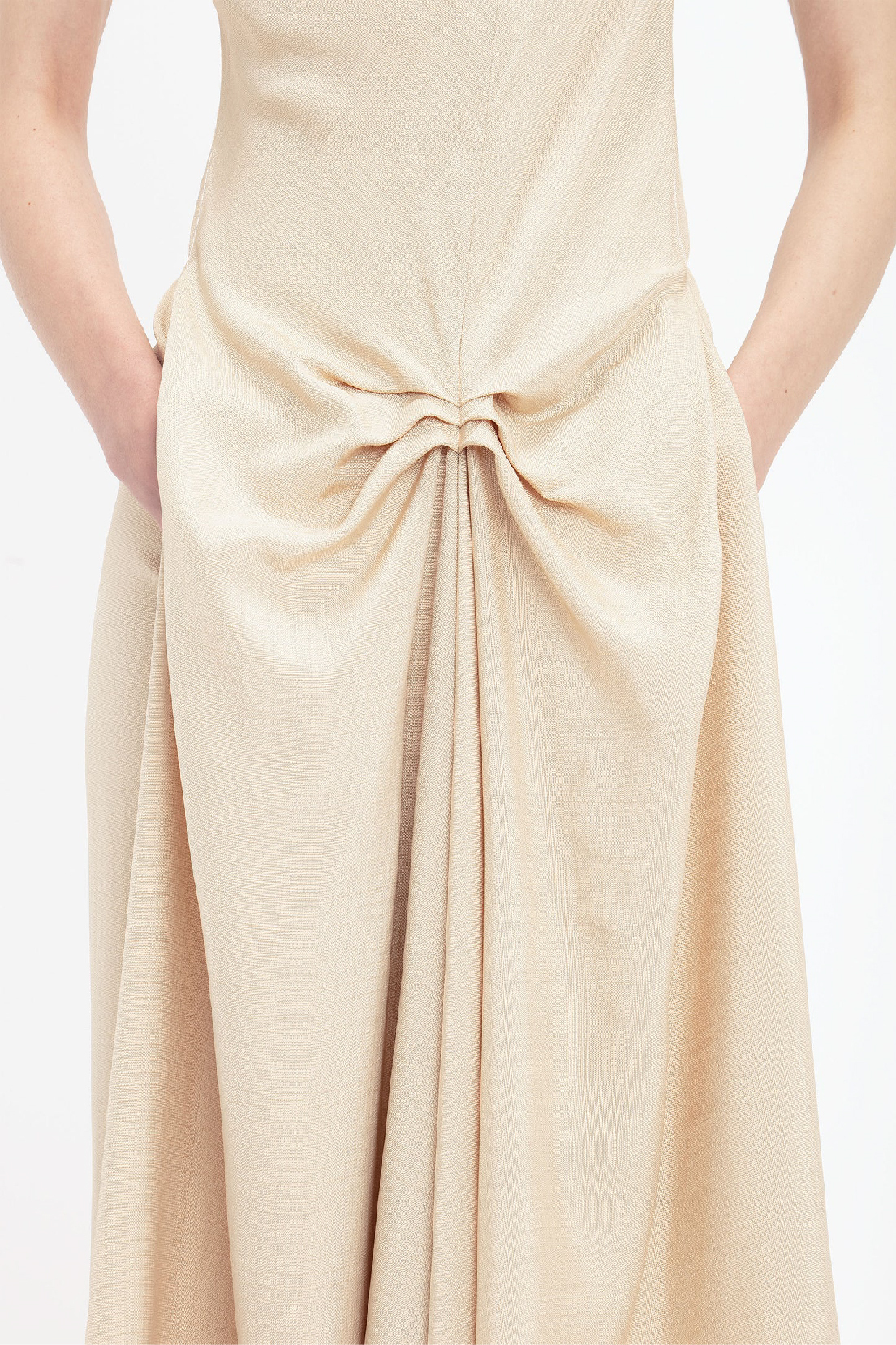 A light pink gathered midi dress