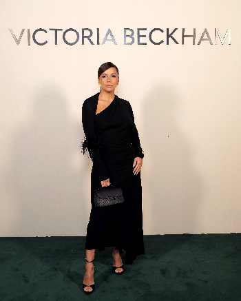 Women in black midi dress