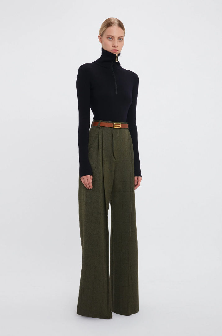 Women in dark green wide leg trousers 