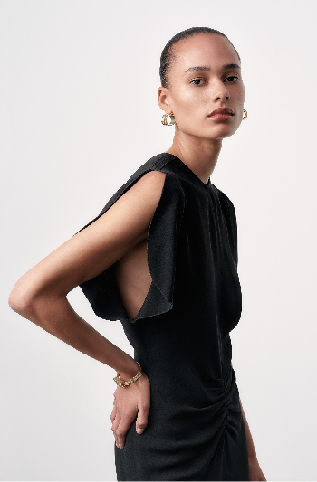 Women in black midi gathered dress