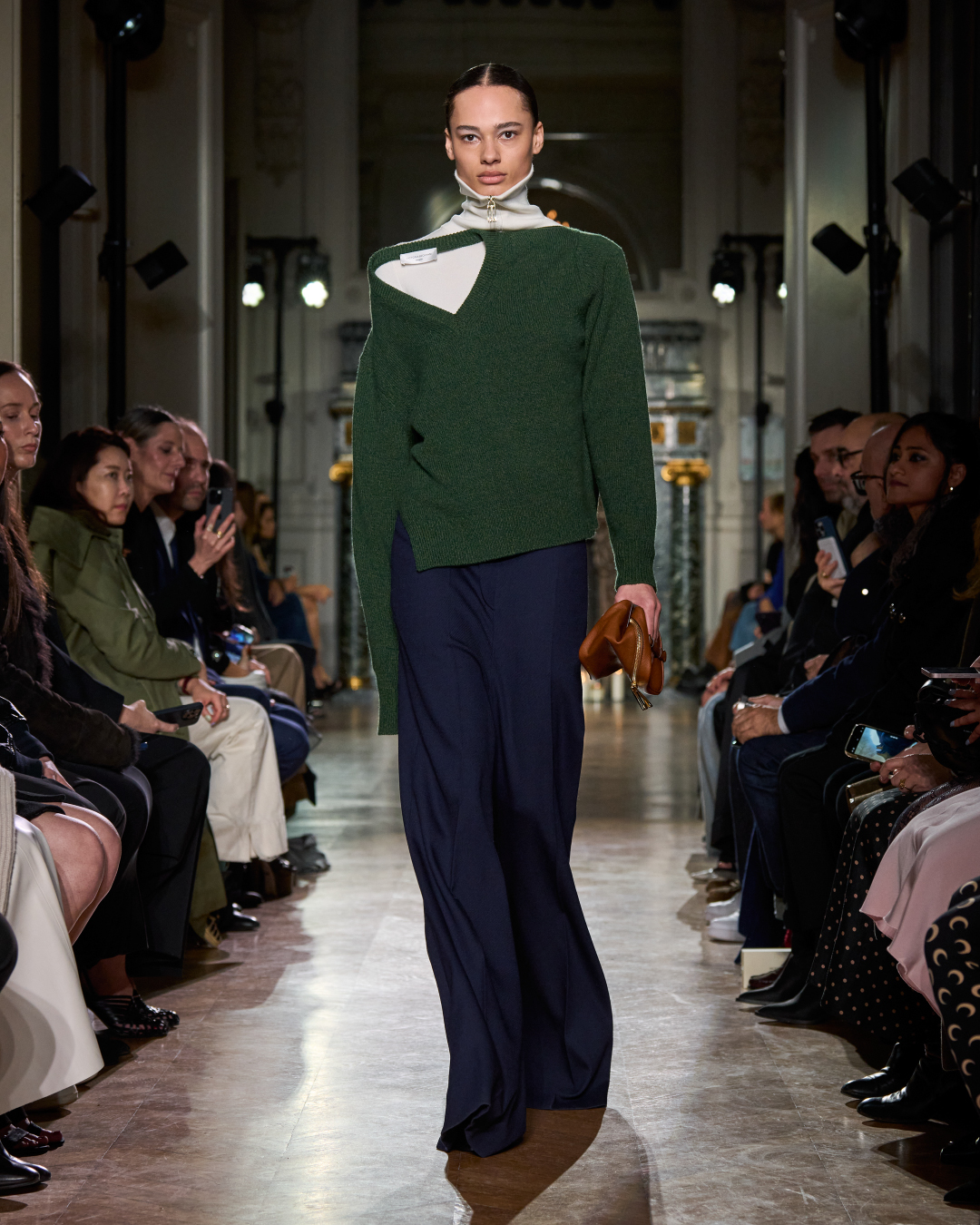 Women in green v-neck jumper 