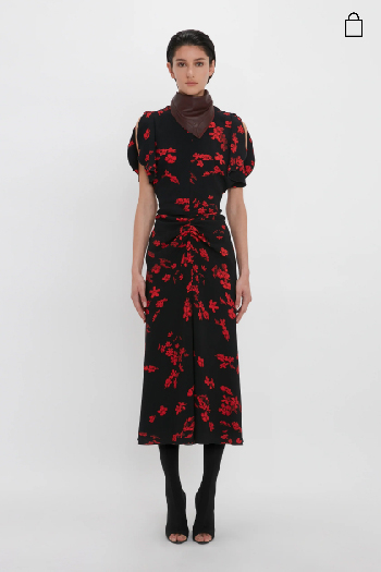 Women in black and red floral gathered waist midi dress 