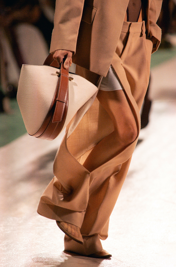 A light brown bag with a darker brown panel 