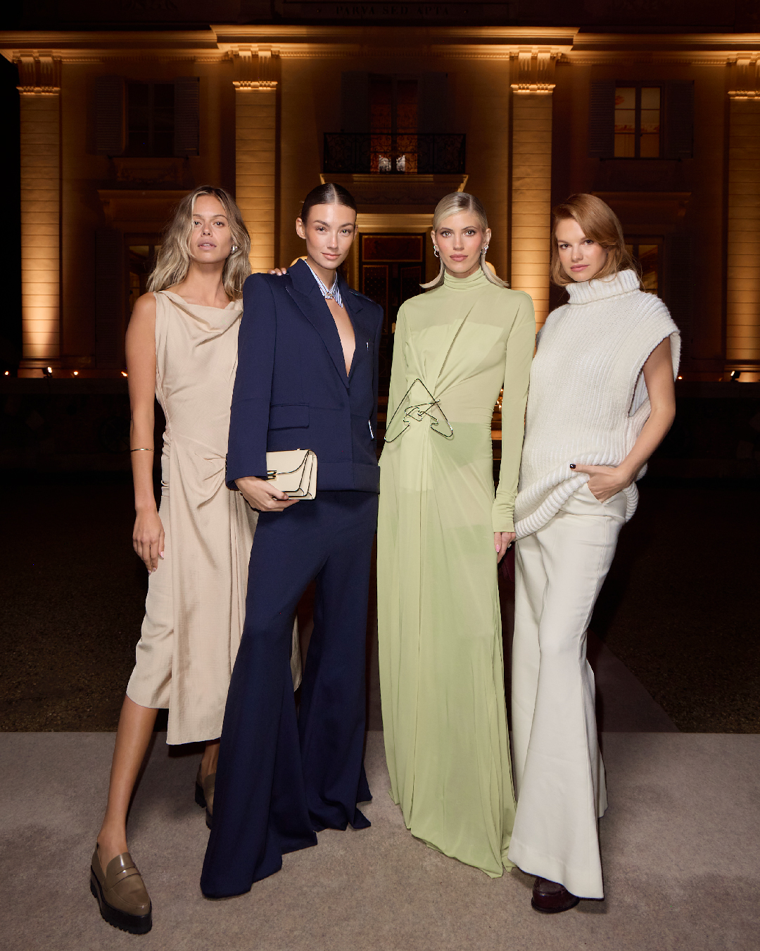 Four women wearing Victoria Beckhams signature looks 