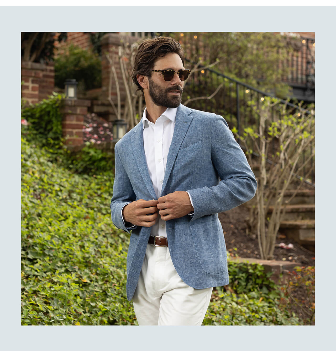 Our Model Wearing the White Vento Giro Inglese Custom Shirt With a Light Coat