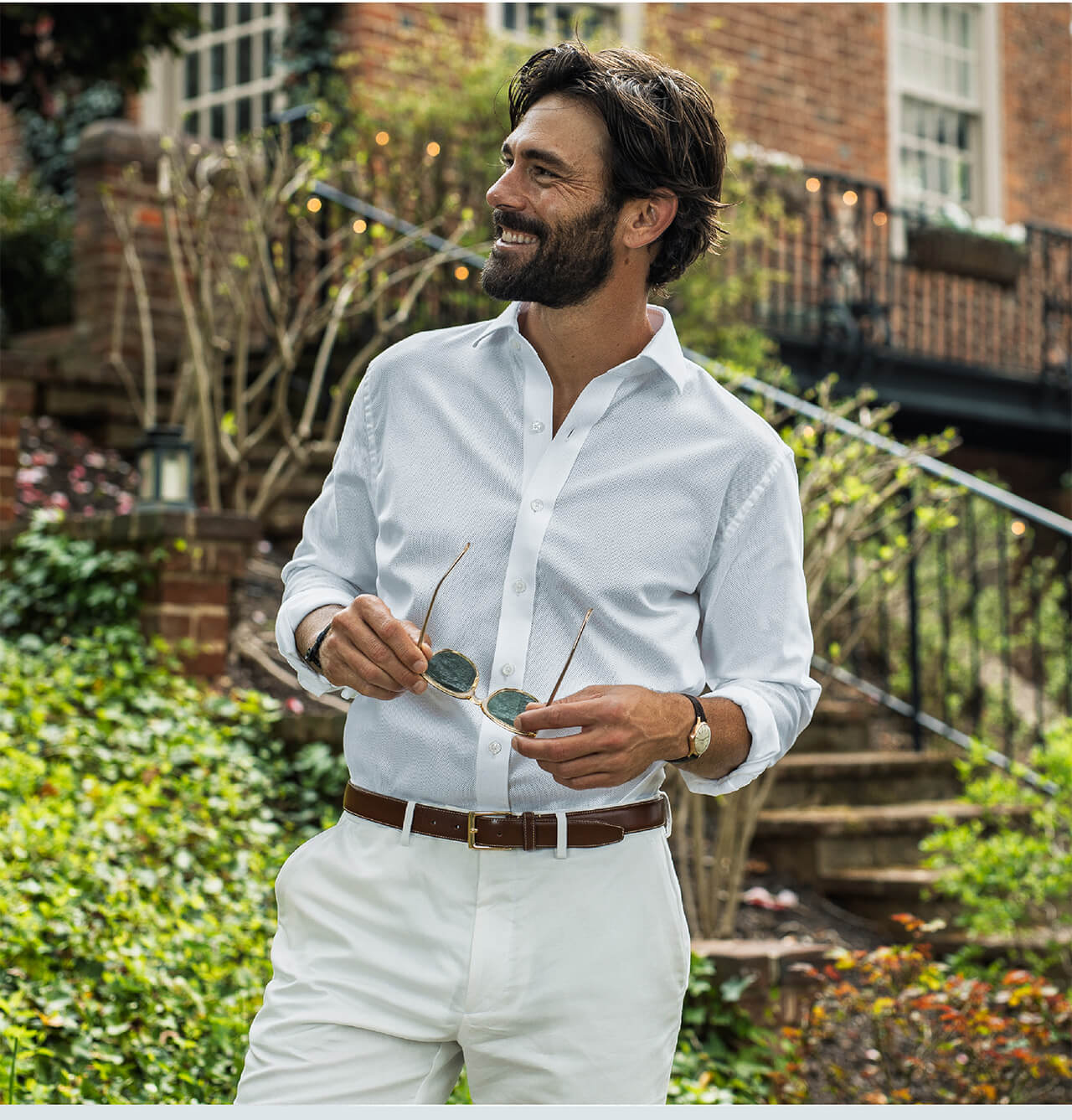 A Man Standing Confidently in Our White Vento Giro Inglese Shirt